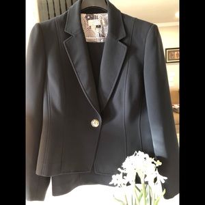 Empowering dark navy blue business suit.